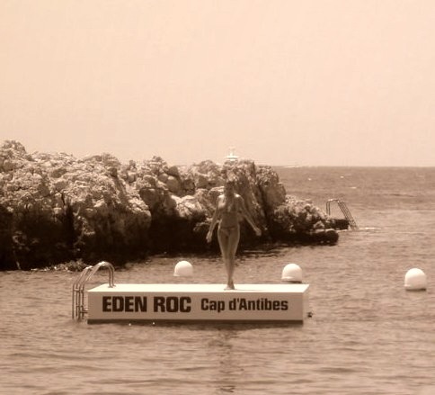 French Riviera 1960s: Woman Diving off Eden Roc Platform at Hotel du Cap, Antibes, France