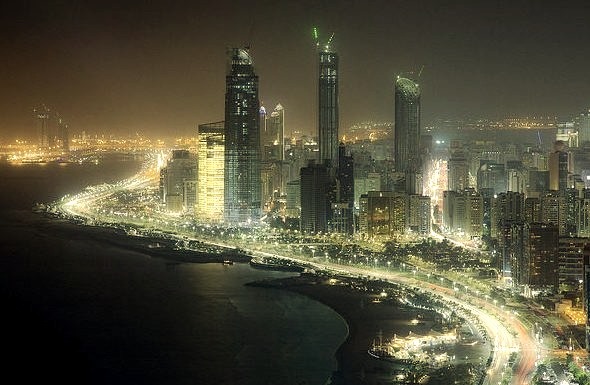 Abu Dhabi skyline at night - the capital city of United Arab Emirates.